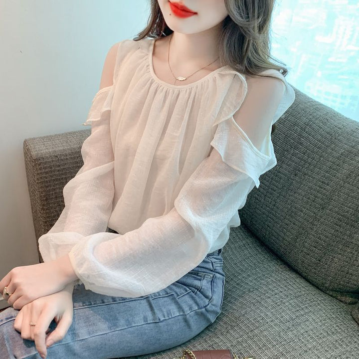 Kvinnors blus med off-shoulder design och volangdetaljer Mirla-Eva Jonsson
