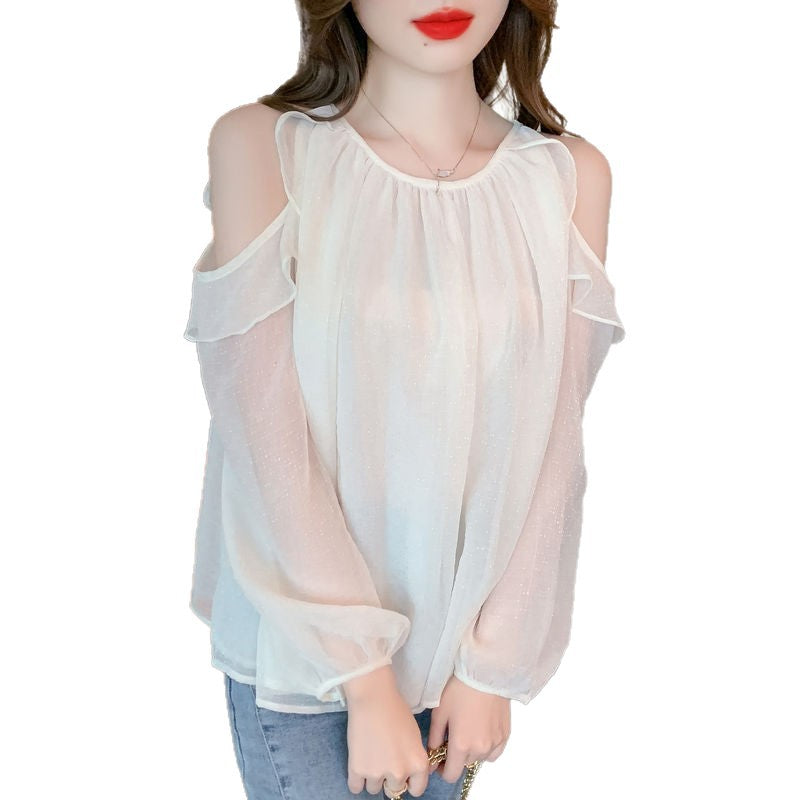 Kvinnors blus med off-shoulder design och volangdetaljer Mirla-Eva Jonsson