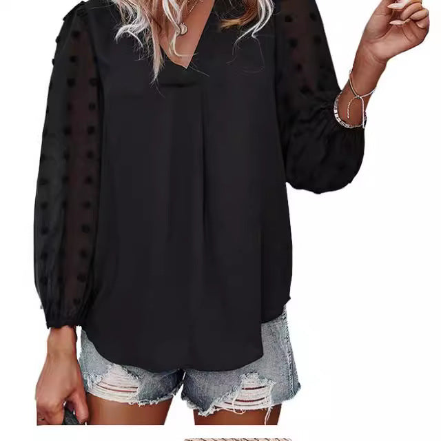 Kvinnors blus med transparenta puffärmar och prickig detalj Mirla-Eva Jonsson
