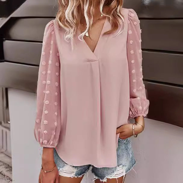 Kvinnors blus med transparenta puffärmar och prickig detalj Mirla-Eva Jonsson