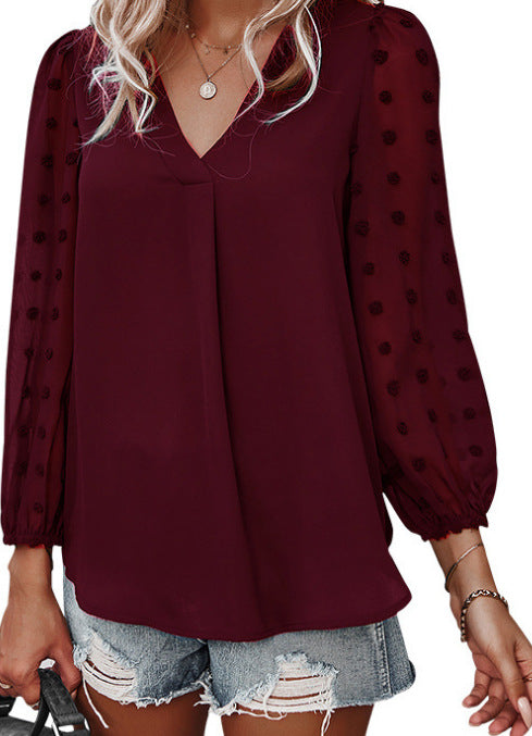 Kvinnors blus med transparenta puffärmar och prickig detalj Mirla-Eva Jonsson