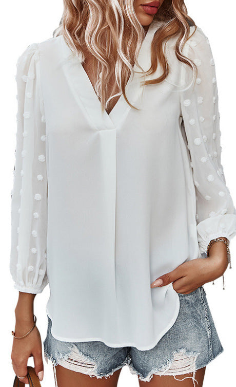 Kvinnors blus med transparenta puffärmar och prickig detalj Mirla-Eva Jonsson