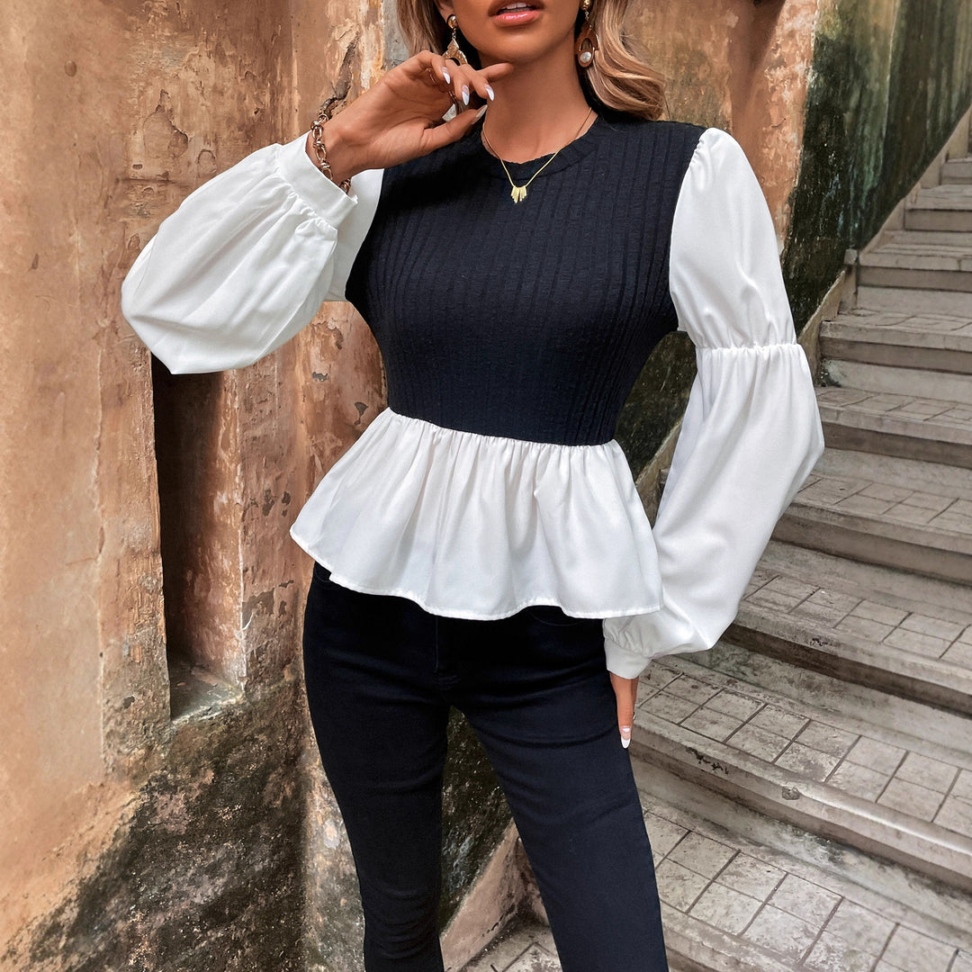 Kvinnors blus med voluminösa puffärmar och texturerad topp Mirla-Eva Jonsson