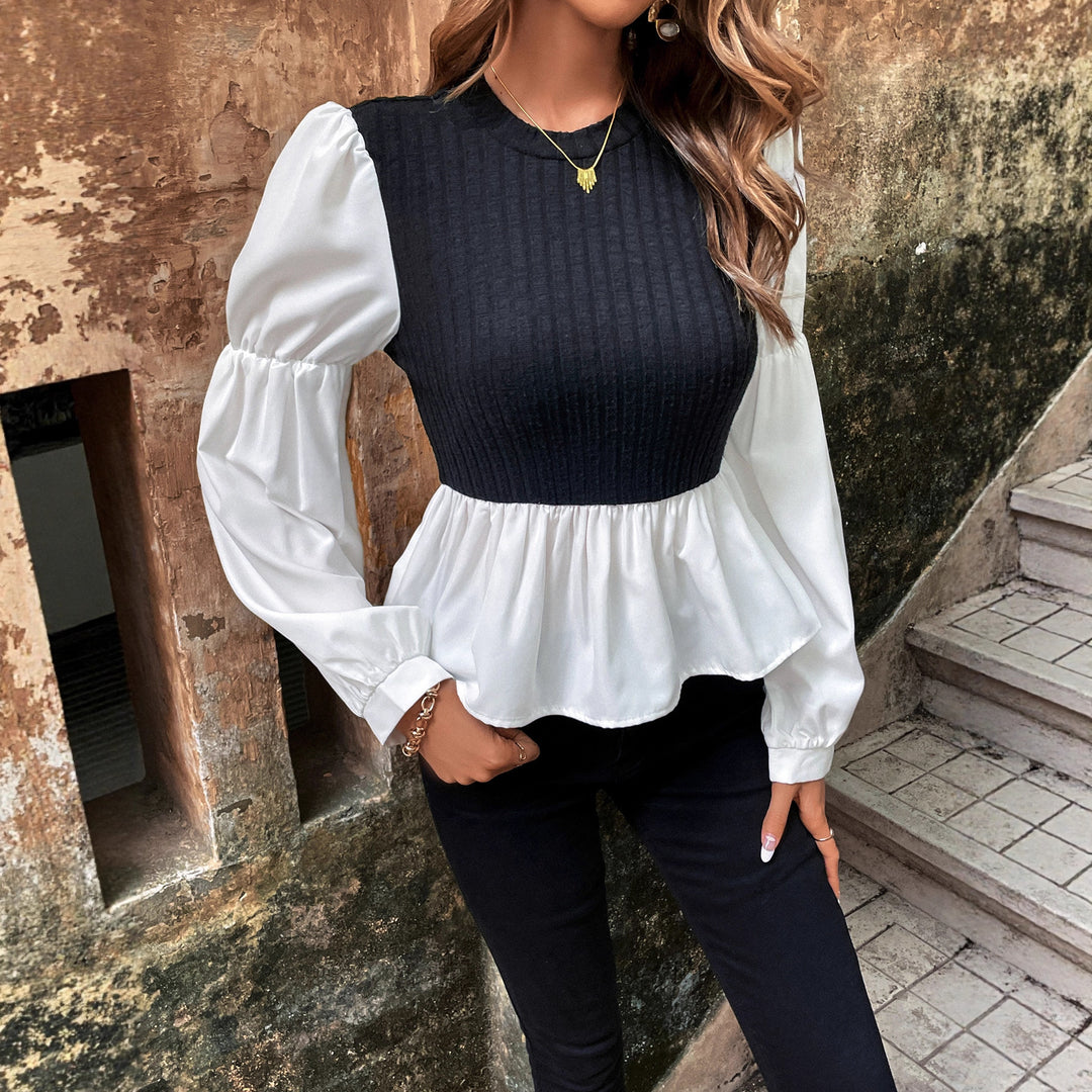 Kvinnors blus med voluminösa puffärmar och texturerad topp Mirla-Eva Jonsson