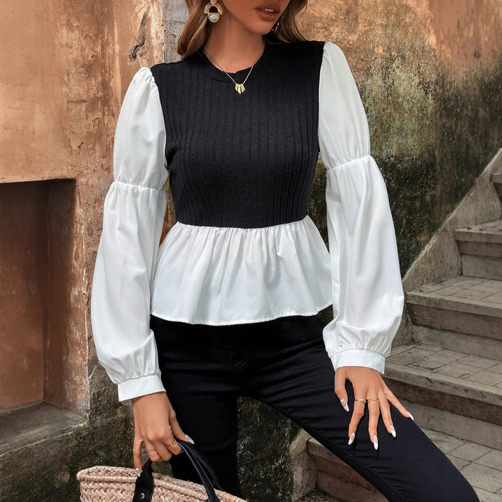 Kvinnors blus med voluminösa puffärmar och texturerad topp Mirla-Eva Jonsson