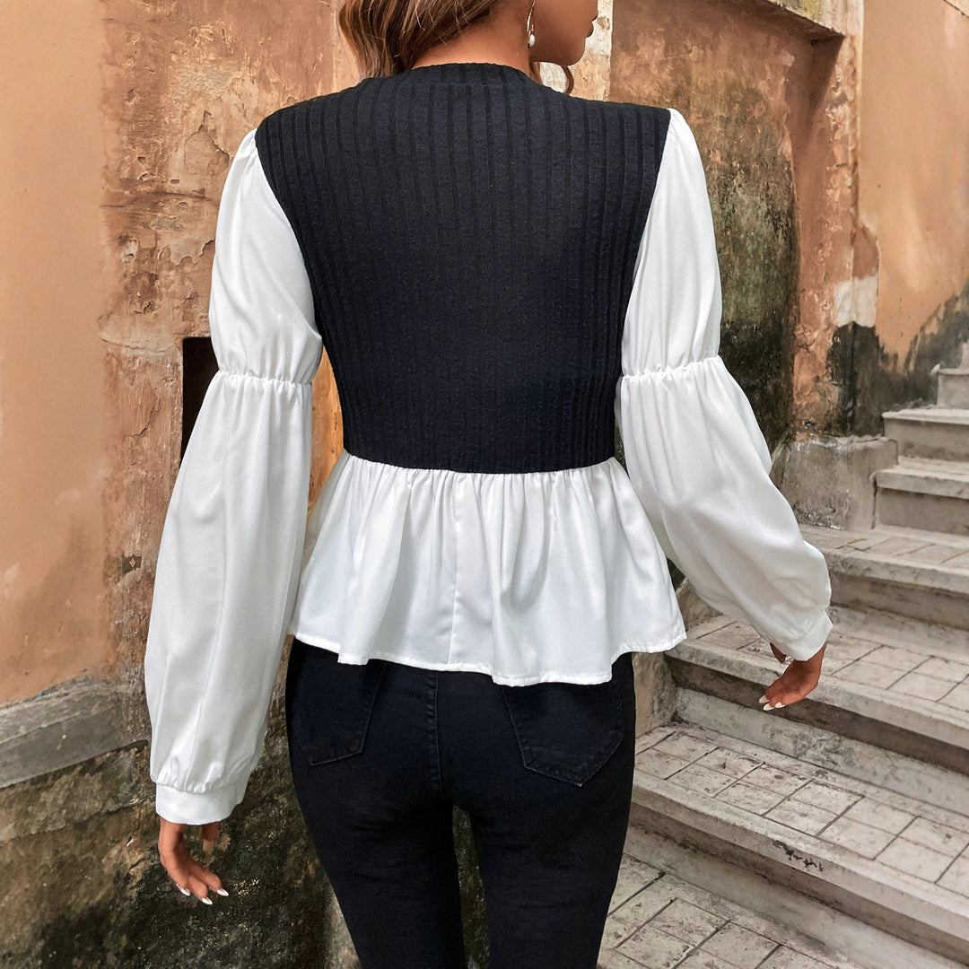 Kvinnors blus med voluminösa puffärmar och texturerad topp Mirla-Eva Jonsson