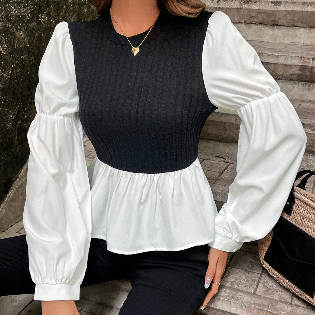 Kvinnors blus med voluminösa puffärmar och texturerad topp Mirla-Eva Jonsson