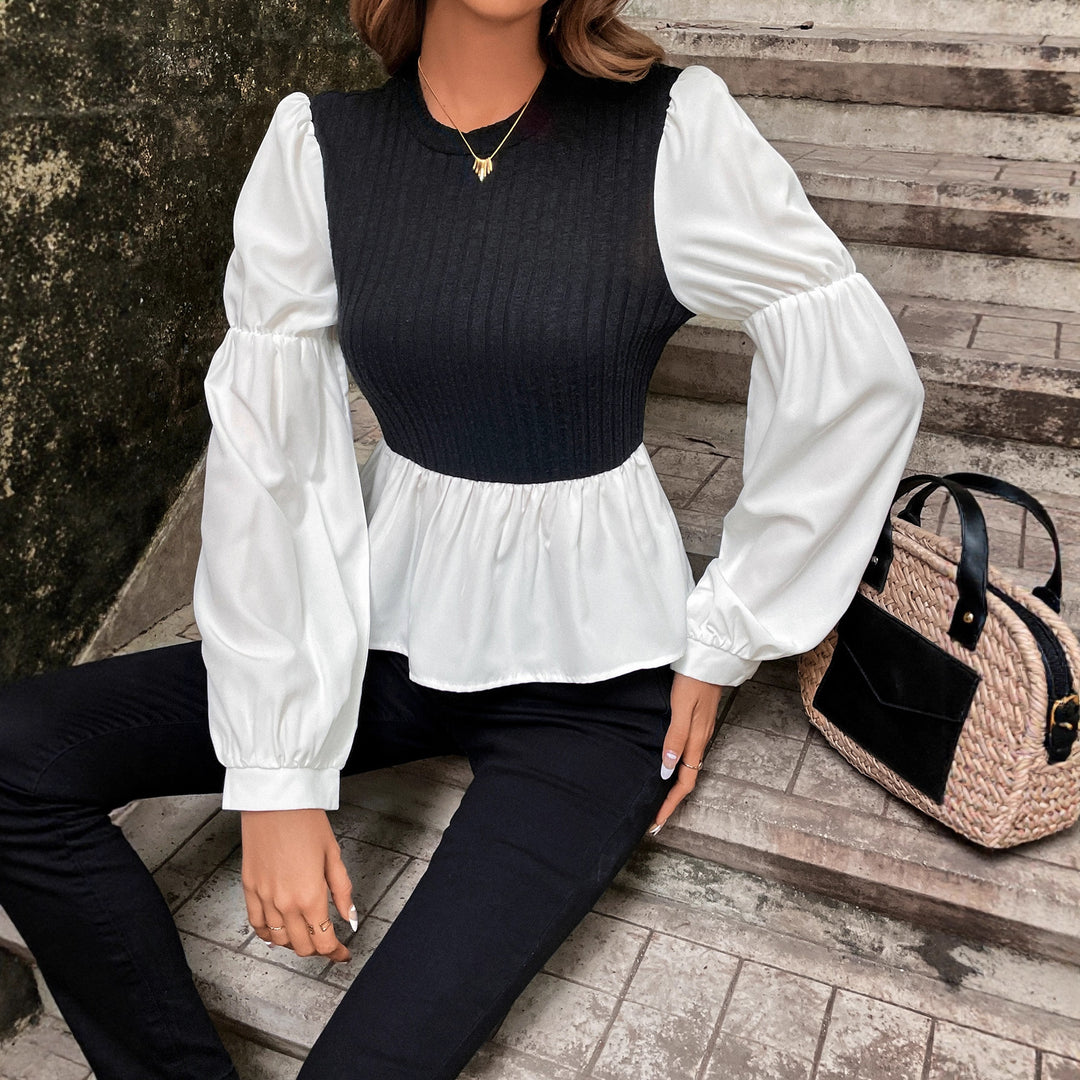 Kvinnors blus med voluminösa puffärmar och texturerad topp Mirla-Eva Jonsson
