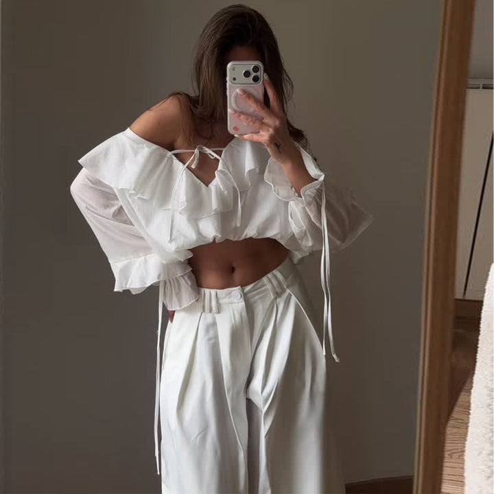 Kvinnors blus med voluminösa volangdetaljer och kaptenärmar-Eva Jonsson