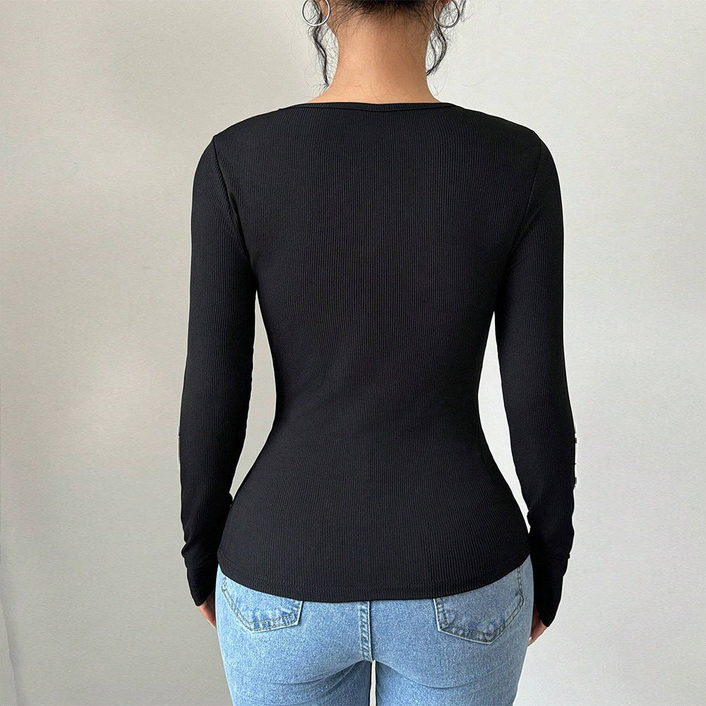 Kvinnors bodysuit med dekorativa rosetter och långa ärmar Mirla-Eva Jonsson