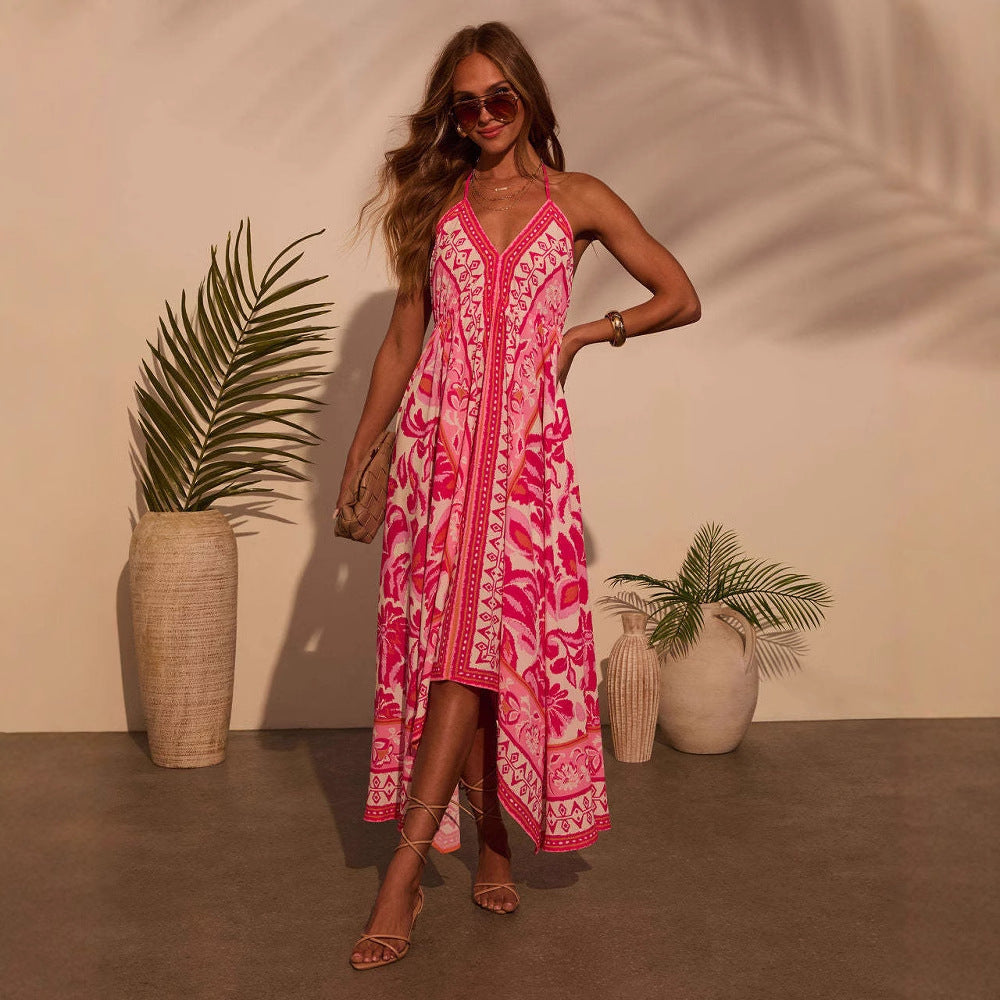 Kvinnors boho-inspirerad maxiklänning med elegant V-ringning och asymmetrisk nederkant Mirla-Eva Jonsson