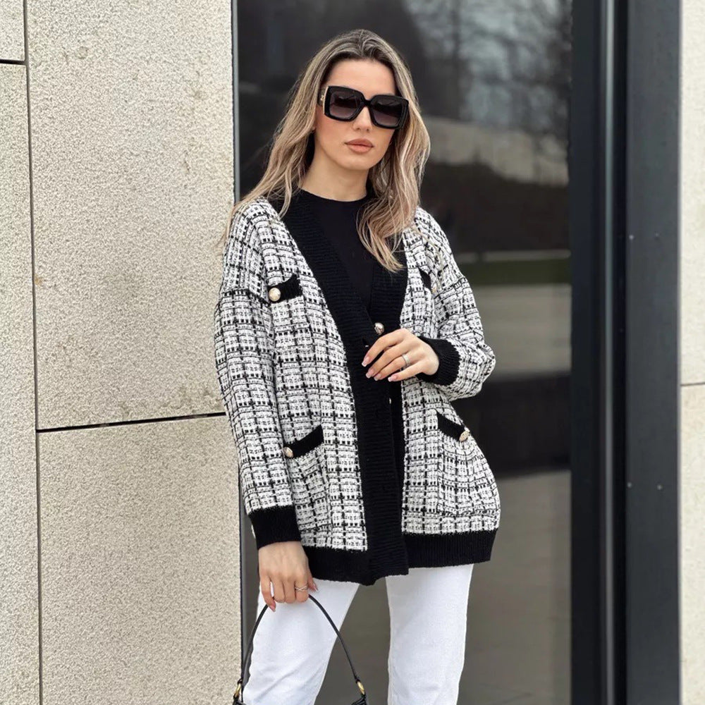 Kvinnors bouclé kofta med eleganta knapppåsar Mirla-Eva Jonsson