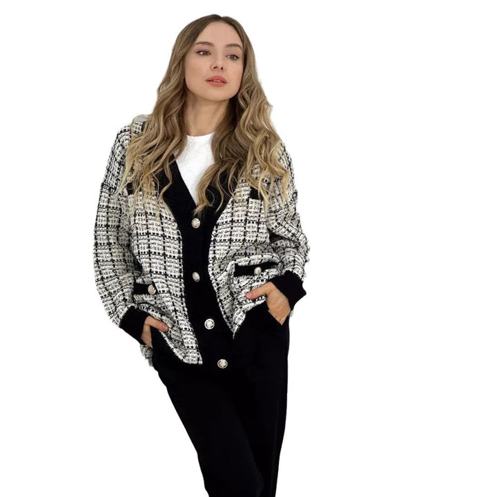 Kvinnors bouclé kofta med eleganta knapppåsar Mirla-Eva Jonsson