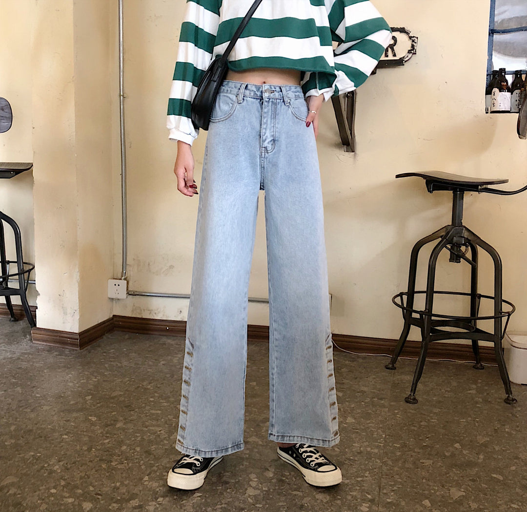 Kvinnors breda jeans med dekorativa knappp detaljer Mirla-Eva Jonsson