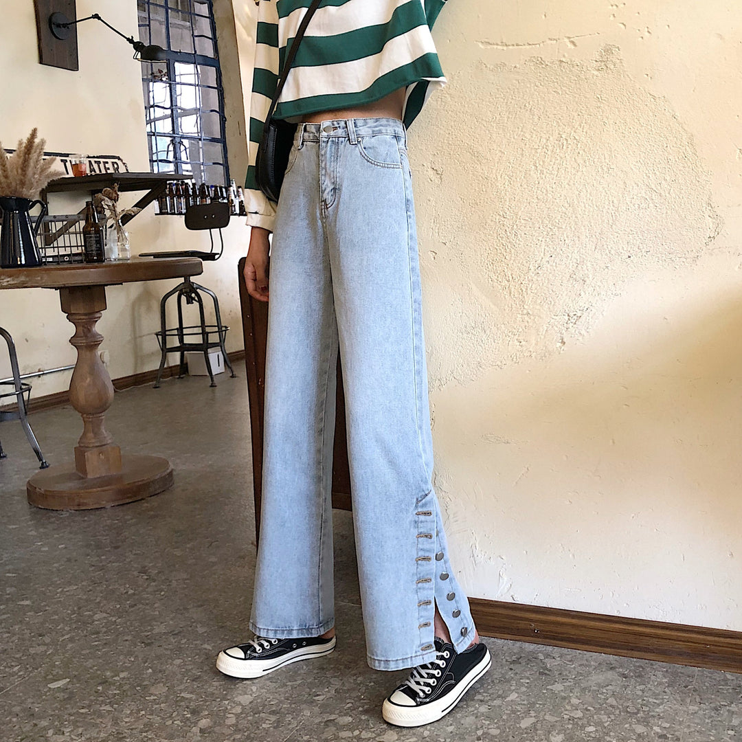 Kvinnors breda jeans med dekorativa knappp detaljer Mirla-Eva Jonsson