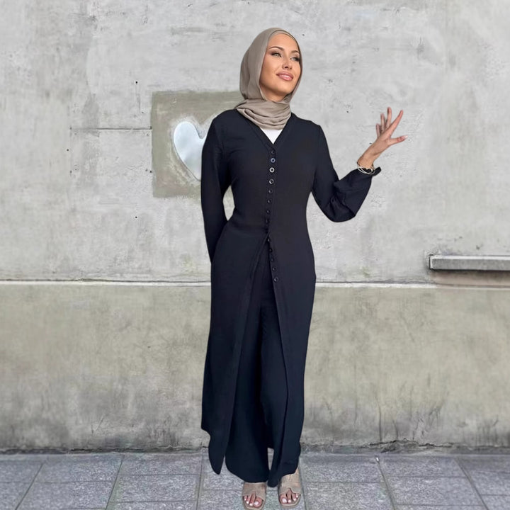 Kvinnors byxdress med elegant knappdesign och vida ben Mirla-Eva Jonsson