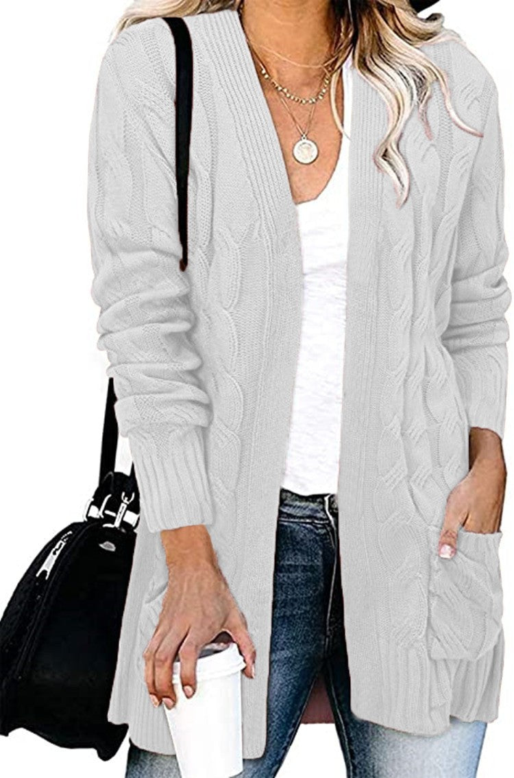 Kvinnors cardigan i elegant kabelmönster med öppna fickor Mirla-Eva Jonsson