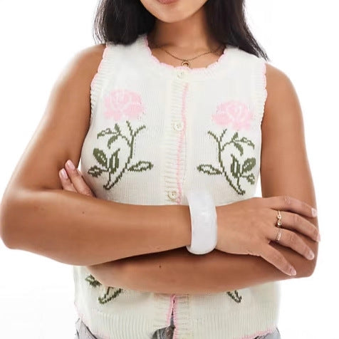 Kvinnors cardigan med blommönster och eleganta detaljer Mirla-Eva Jonsson