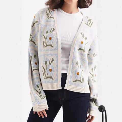 Kvinnors cardigan med blommönster och eleganta detaljer Mirla-Eva Jonsson