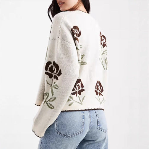 Kvinnors cardigan med blommönster och eleganta detaljer Mirla-Eva Jonsson