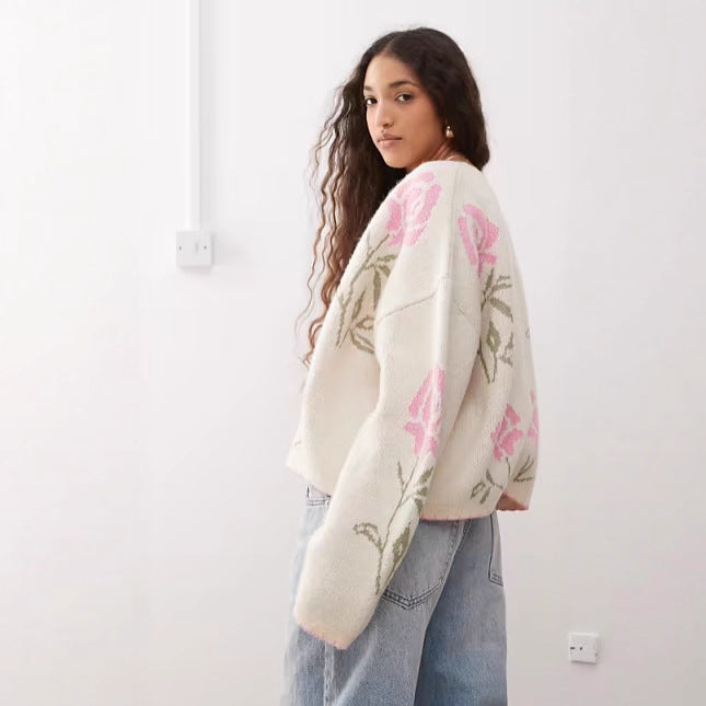 Kvinnors cardigan med blommönster och eleganta detaljer Mirla-Eva Jonsson