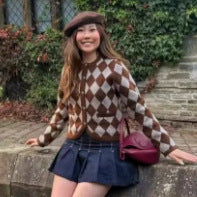 Kvinnors cardigan med elegant diamantmönster och hjärtknappar Mirla-Eva Jonsson
