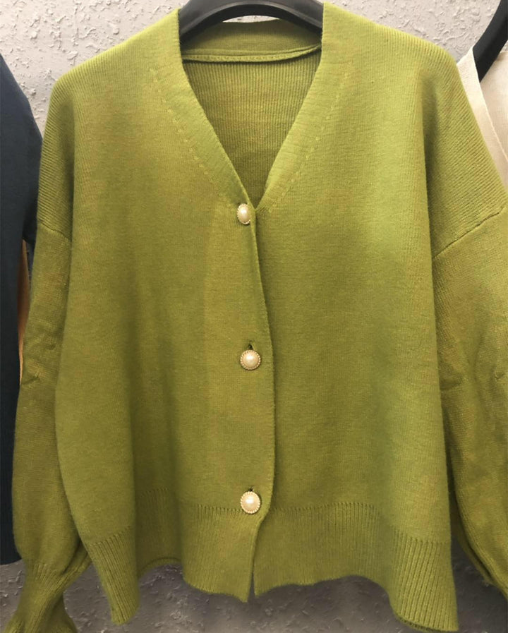 Kvinnors cardigan med eleganta pärlknappar Mirla-Eva Jonsson