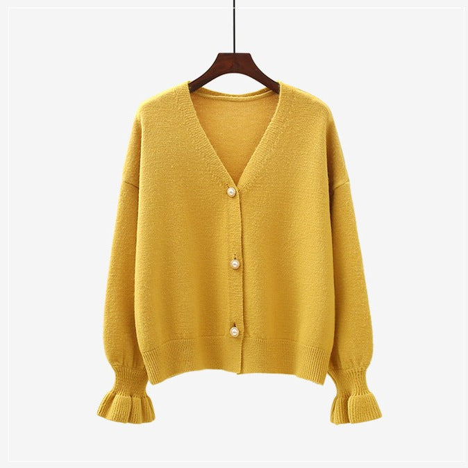 Kvinnors cardigan med eleganta pärlknappar Mirla-Eva Jonsson