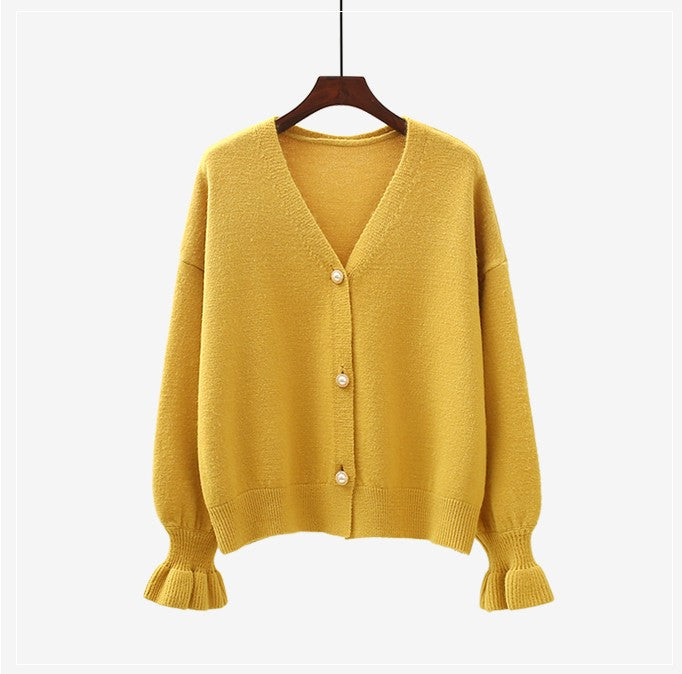 Kvinnors cardigan med eleganta pärlknappar Mirla-Eva Jonsson