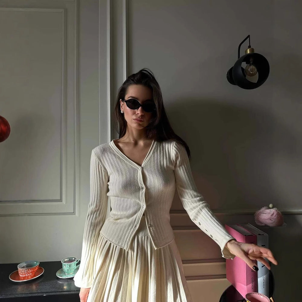 Kvinnors cardigan med fint ribbmönster och ärmknapp Mirla-Eva Jonsson