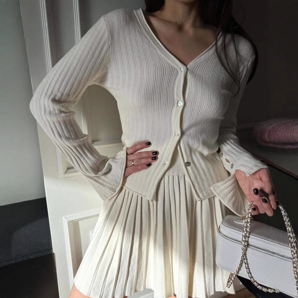 Kvinnors cardigan med fint ribbmönster och ärmknapp Mirla-Eva Jonsson
