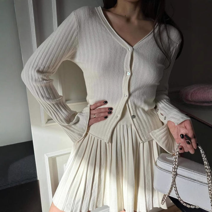 Kvinnors cardigan med fint ribbmönster och ärmknapp Mirla-Eva Jonsson