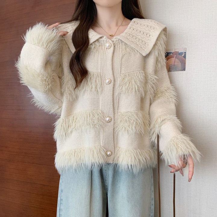 Kvinnors cardigan med flätad krage och faux fur-applikationer Mirla-Eva Jonsson