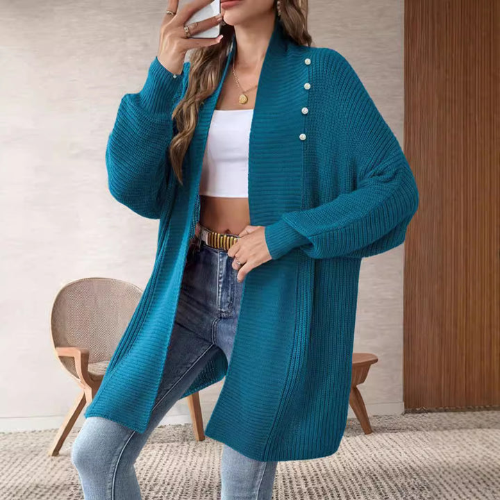 Kvinnors cardigan med pärlknappade knappar och elegant design Mirla-Eva Jonsson