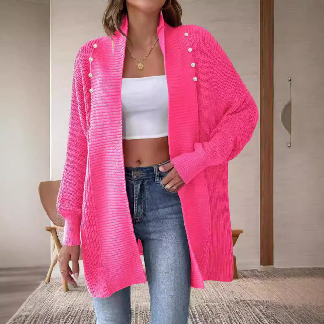 Kvinnors cardigan med pärlknappade knappar och elegant design Mirla-Eva Jonsson