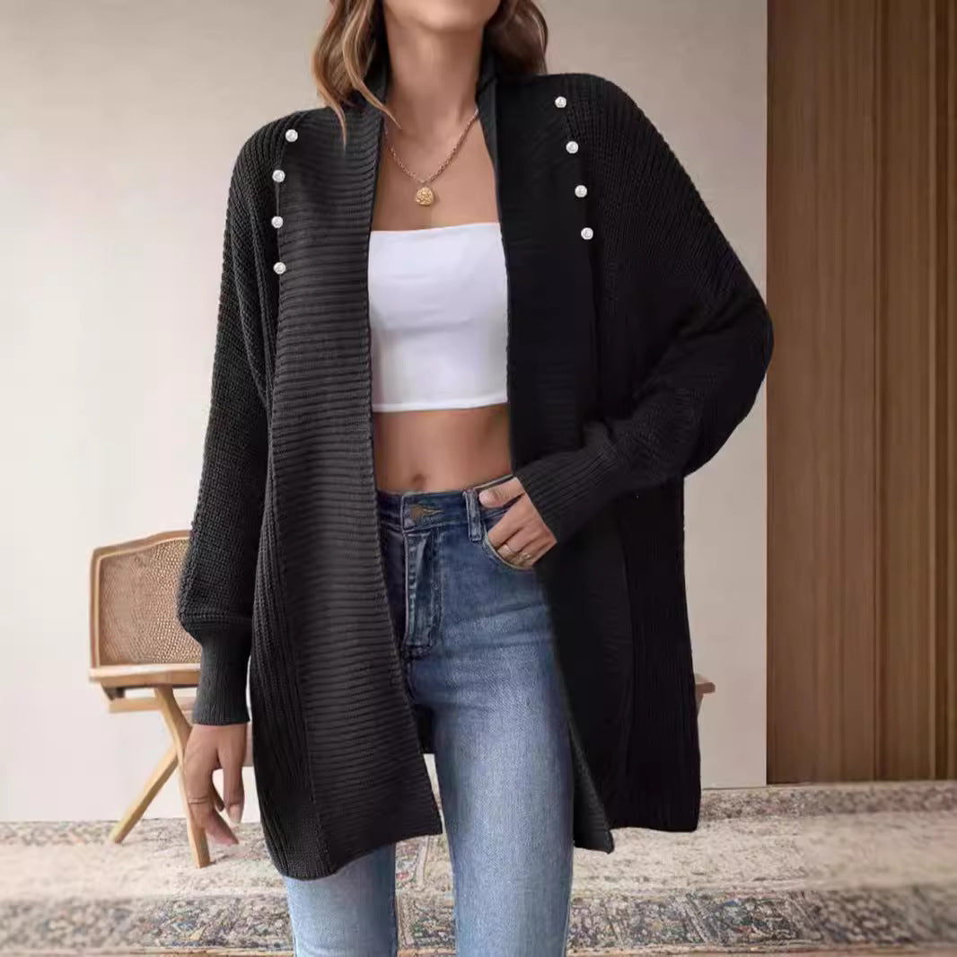 Kvinnors cardigan med pärlknappade knappar och elegant design Mirla-Eva Jonsson