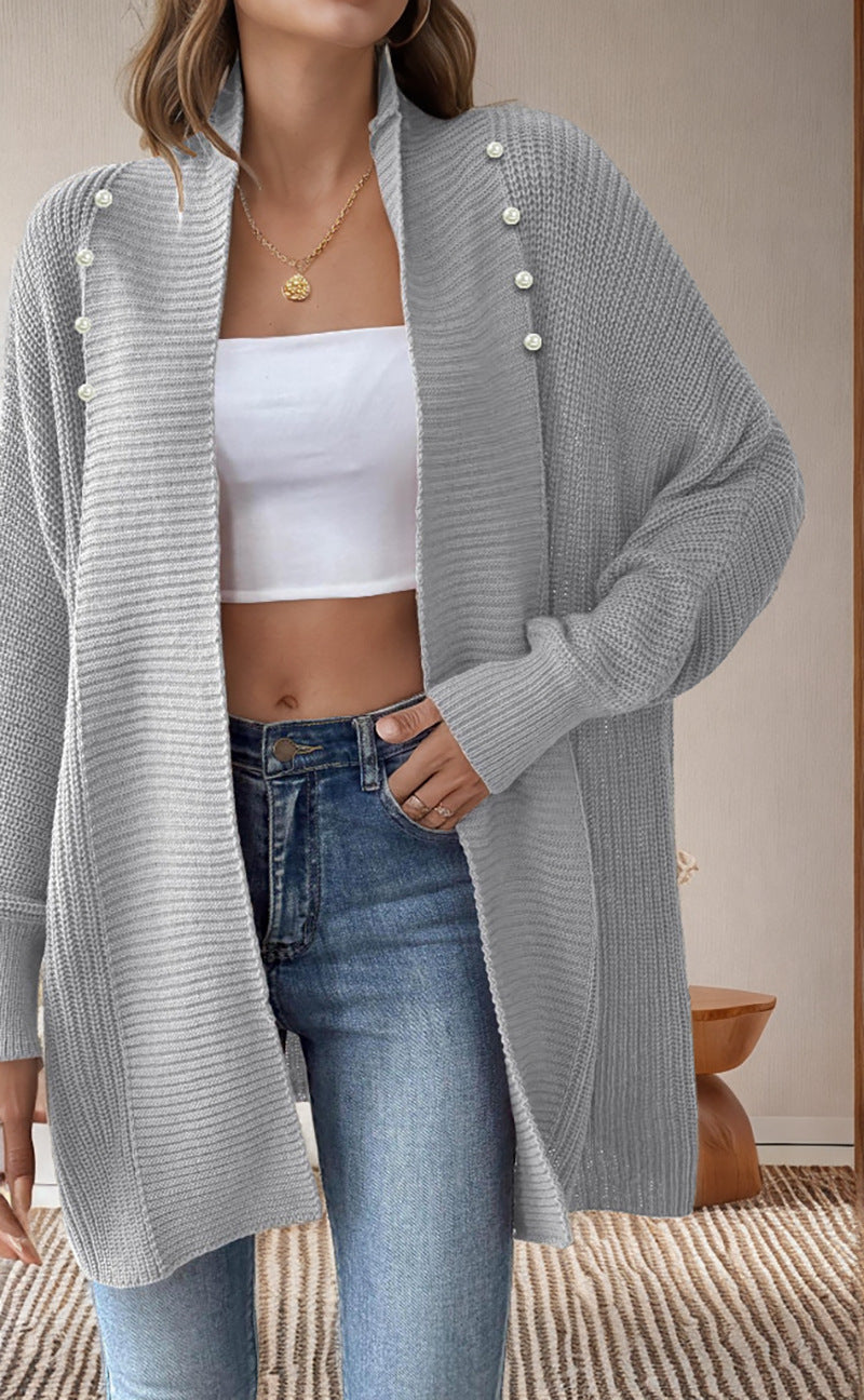 Kvinnors cardigan med pärlknappade knappar och elegant design Mirla-Eva Jonsson