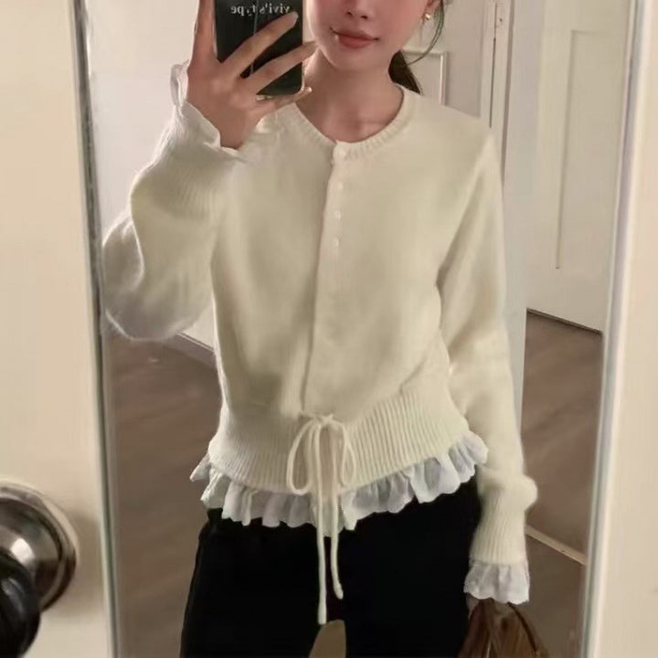 Kvinnors cardigan med volanger och midjeband Mirla-Eva Jonsson