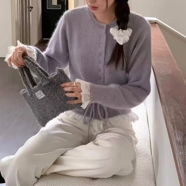 Kvinnors cardigan med volanger och midjeband Mirla-Eva Jonsson