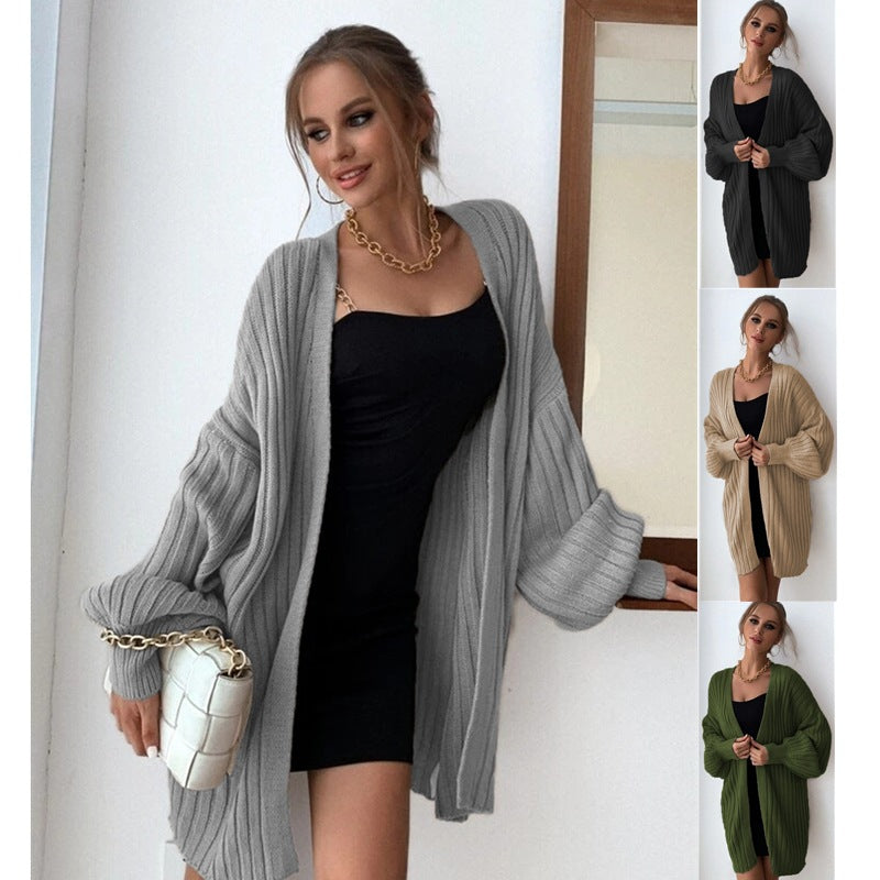 Kvinnors chunky-knit cardigan med öppen skärning och voluminösa ärmar Mirla-Eva Jonsson