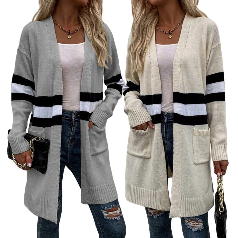 Kvinnors chunky stickad cardigan med avslappnade ränder och djupa fickor Mirla-Eva Jonsson