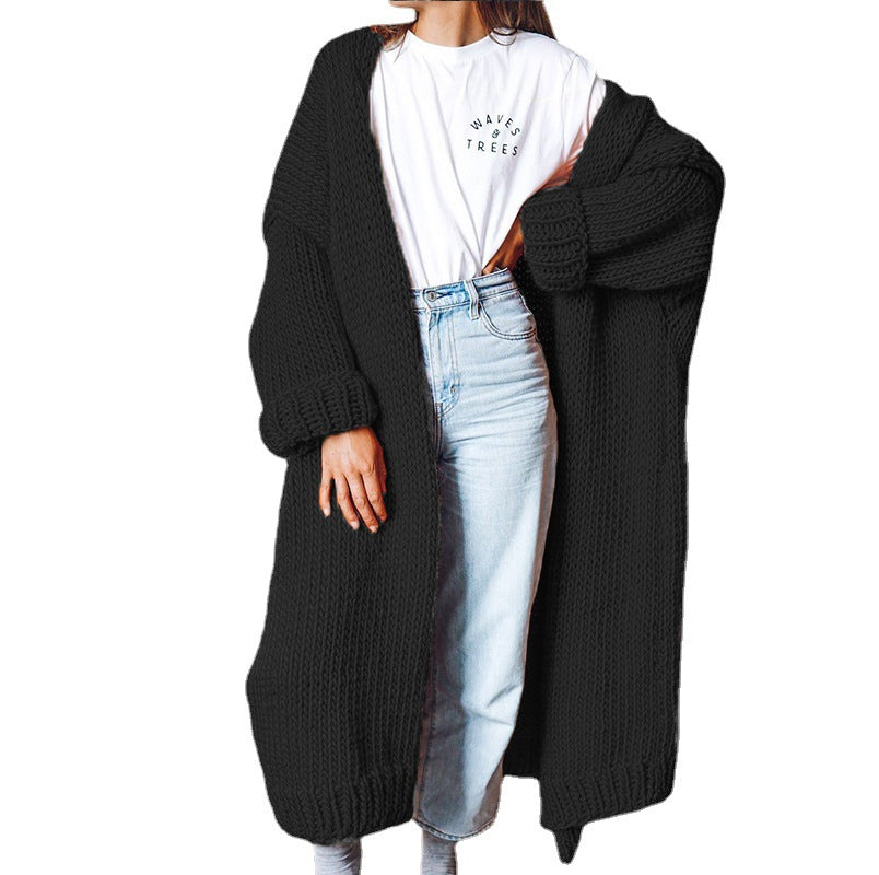 Kvinnors chunky stickad cardigan med bekväm oversized passform och djupa fickor Mirla-Eva Jonsson
