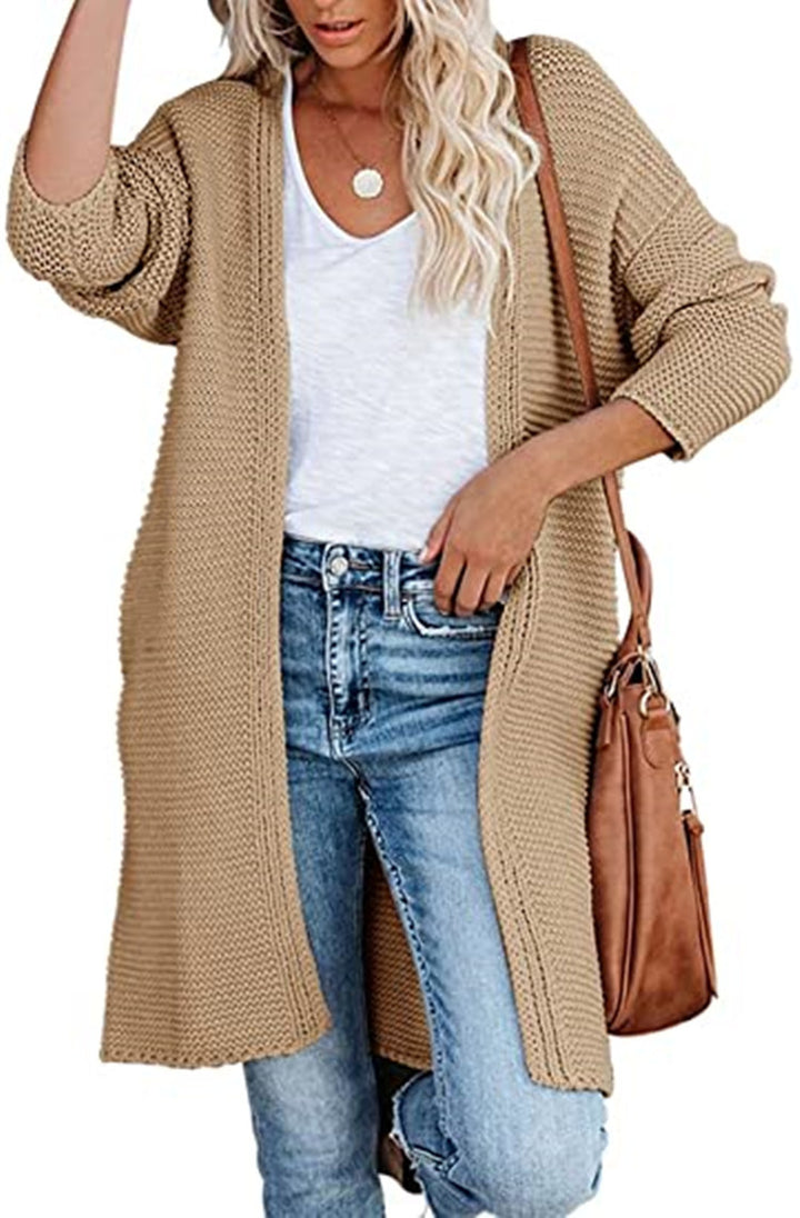Kvinnors chunky stickad cardigan med en avslappnad passform och öppna kanter Mirla-Eva Jonsson