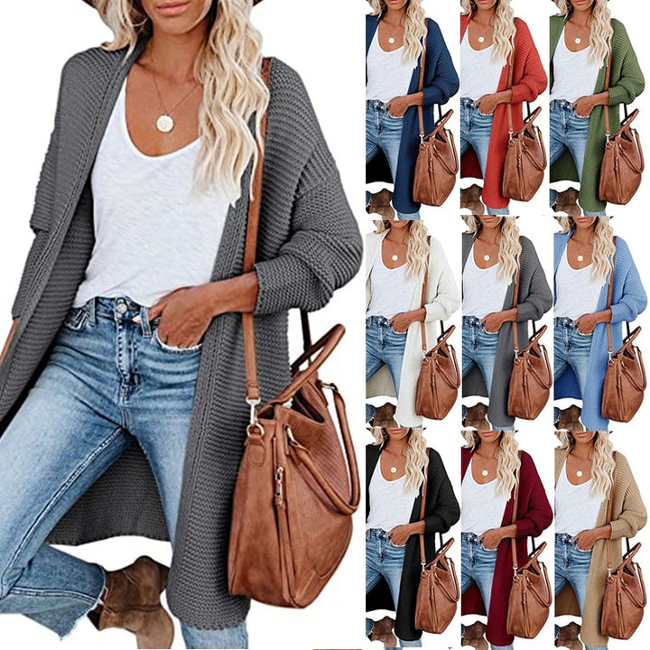 Kvinnors chunky stickad cardigan med en avslappnad passform och öppna kanter Mirla-Eva Jonsson