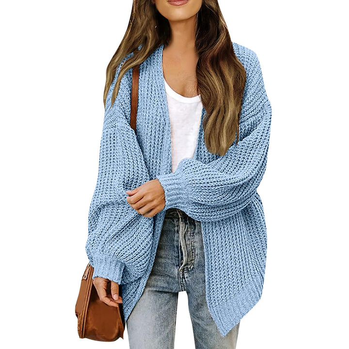 Kvinnors chunky stickad cardigan med en avslappnad passform och sänkta axlar Mirla-Eva Jonsson