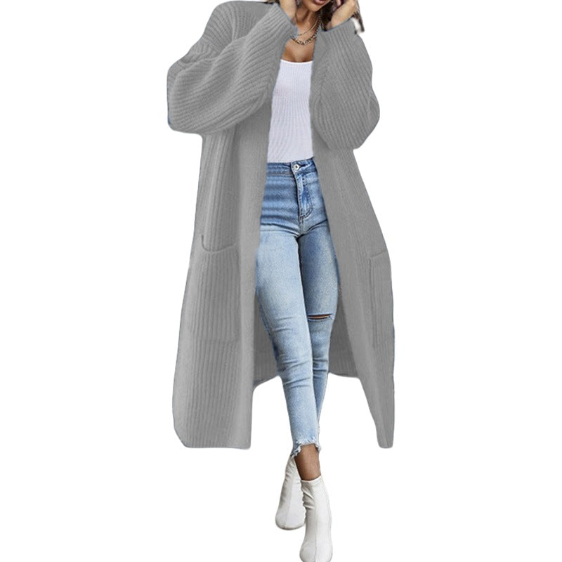 Kvinnors chunky stickad cardigan med fickor och öppen frontdesign Mirla-Eva Jonsson