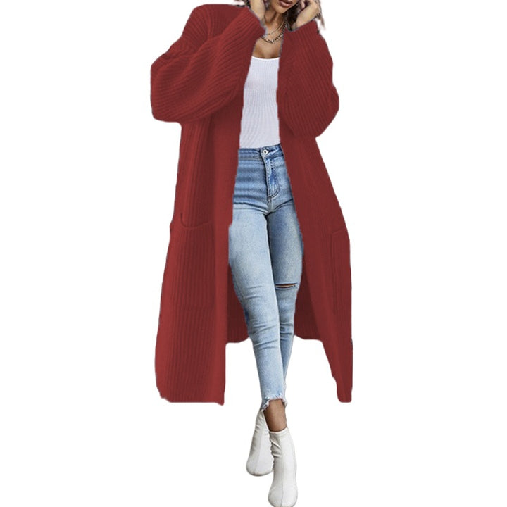 Kvinnors chunky stickad cardigan med fickor och öppen frontdesign Mirla-Eva Jonsson