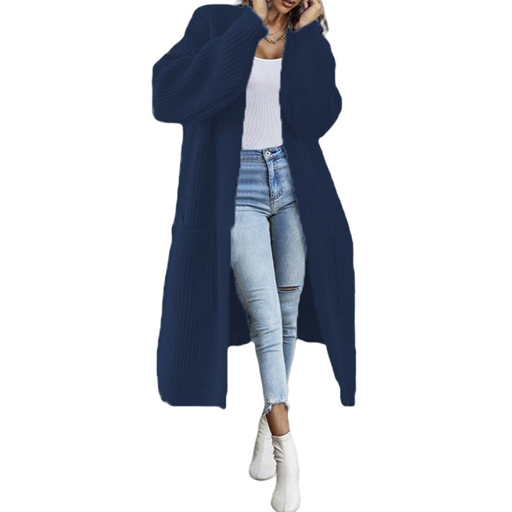 Kvinnors chunky stickad cardigan med fickor och öppen frontdesign Mirla-Eva Jonsson