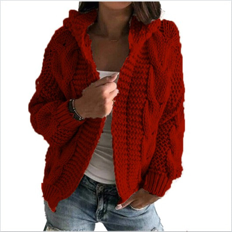 Kvinnors chunky stickad cardigan med huva och djupa fickor Mirla-Eva Jonsson