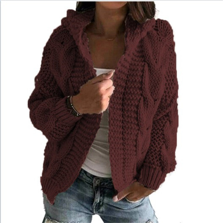 Kvinnors chunky stickad cardigan med huva och djupa fickor Mirla-Eva Jonsson